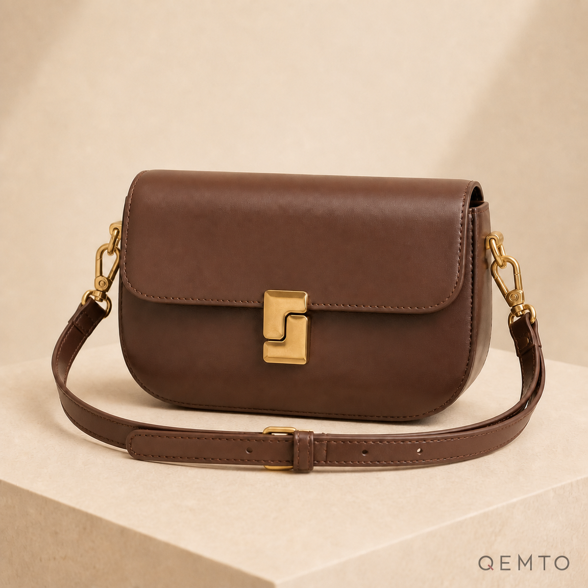 QEMTO Livia shoulder bag in coffee split leather with gold-tone push-lock clasp