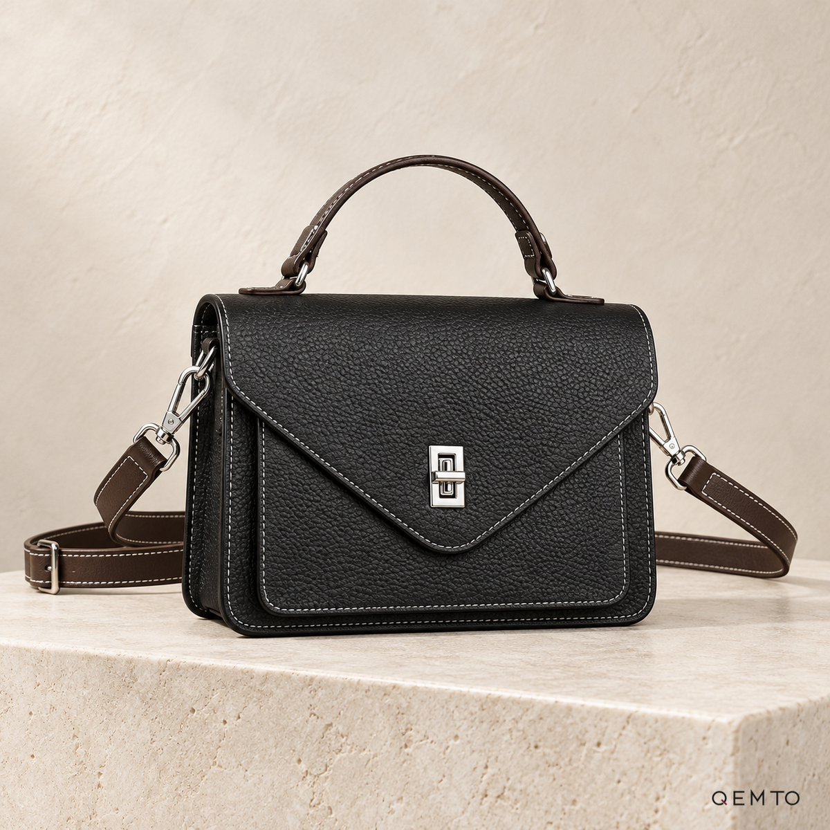 QEMTO Maya Envelope Bag in Black full-grain cowhide leather, front view