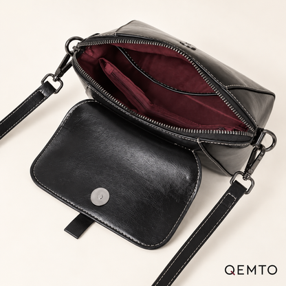 QEMTO Nora Crossbody Bag interior — zip-top compartment and front zip pocket