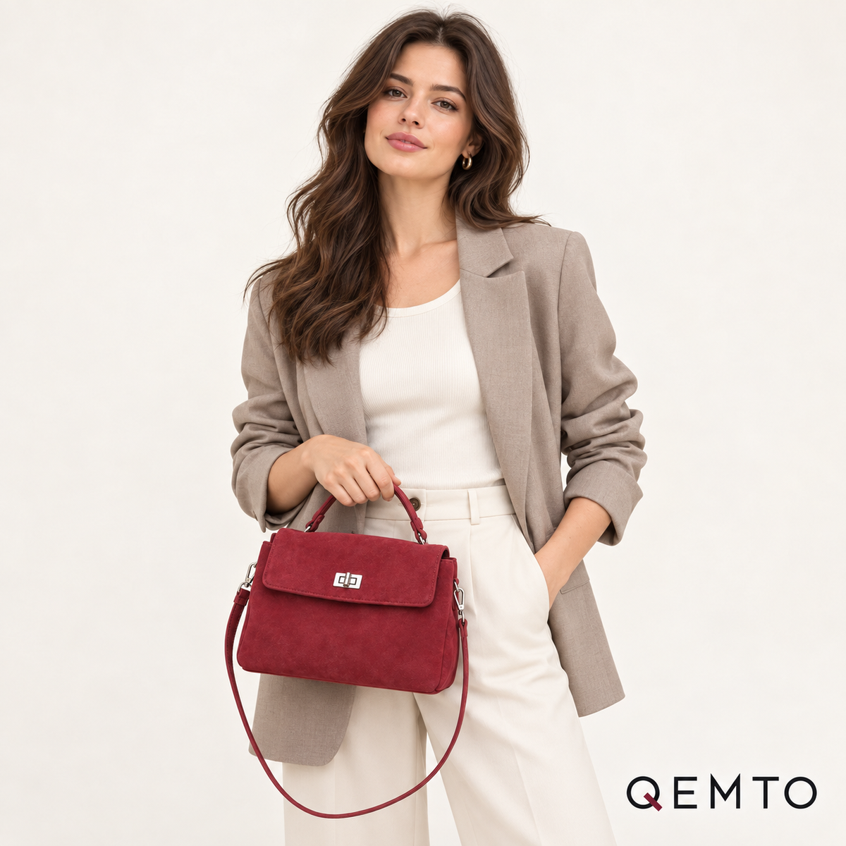 QEMTO Vera Top-Handle Bag in red suede worn by a model with top handle