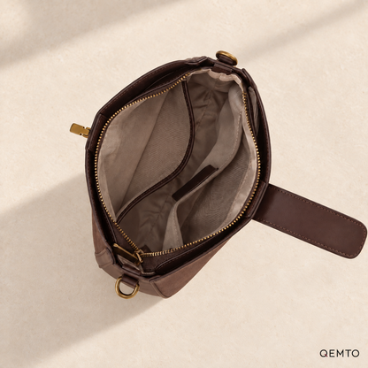 QEMTO Mara Saddle Bag — zip-top interior and pockets